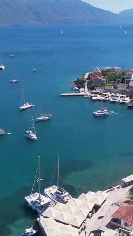 coastal village with yachts and boats