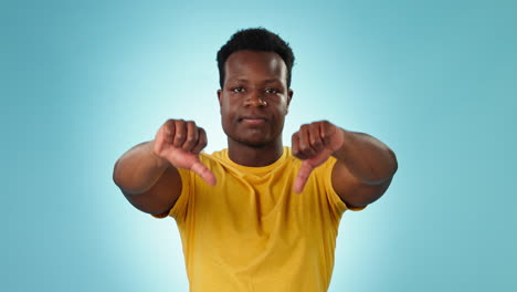thumbs down, face or man in studio with no sign