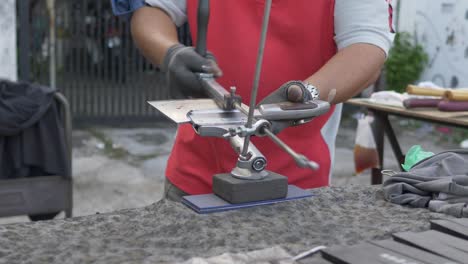 blade, knife sharpening process in morning market