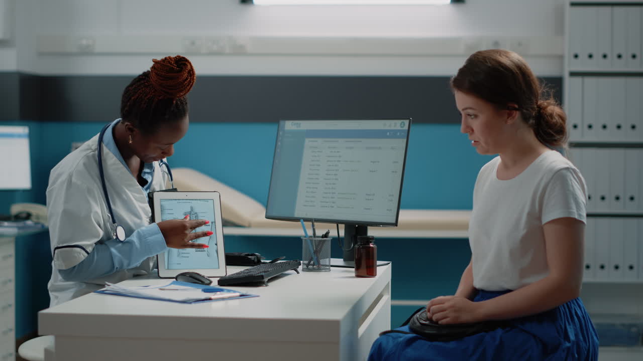 Doctor explaining medical scan to patient