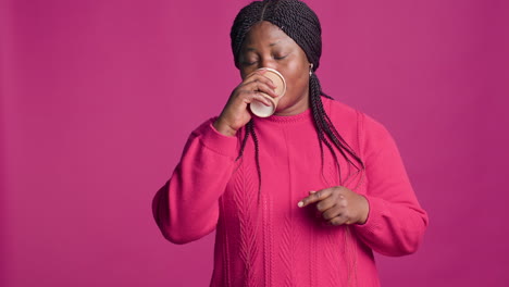 Woman-In-Thoughts-Holding-Cup-Of-Coffee