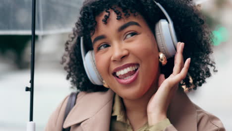 african woman, headphones and dance to music