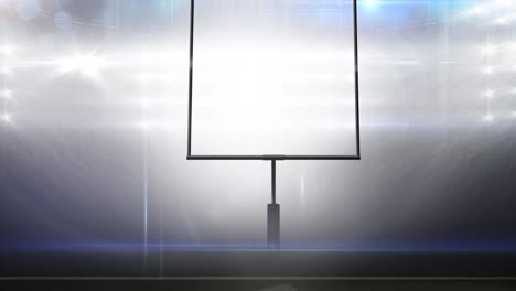 animation of american football goalposts and cloudy sky at floodlit stadium