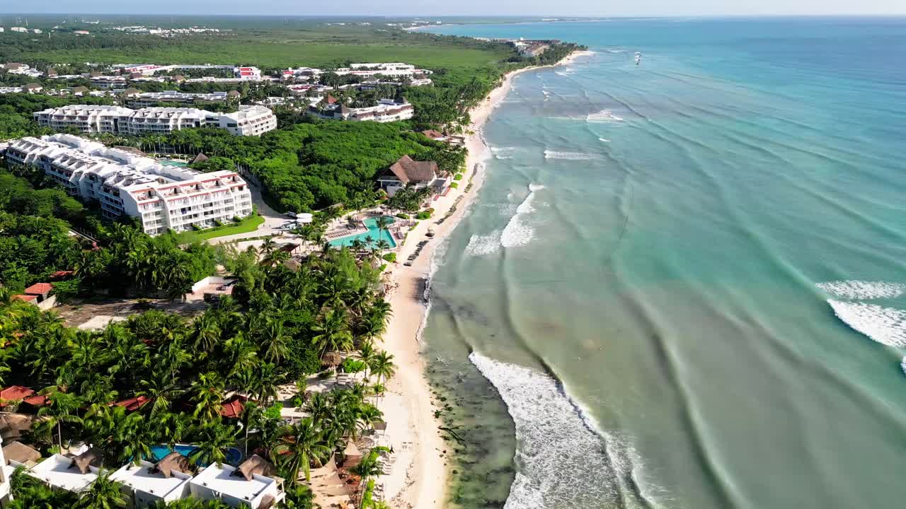 Aerial view of Playa Xcalacoco, Mexico, peaceful beach resort, sunny day