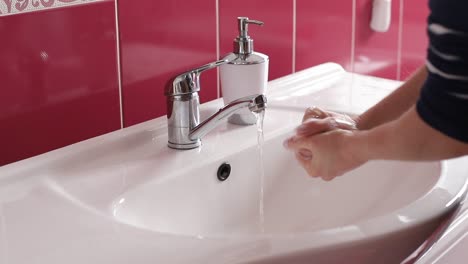 coronavirus pandemic prevention wash hands with soap warm water rubbing fingers washing frequently or using hand sanitizer gel.