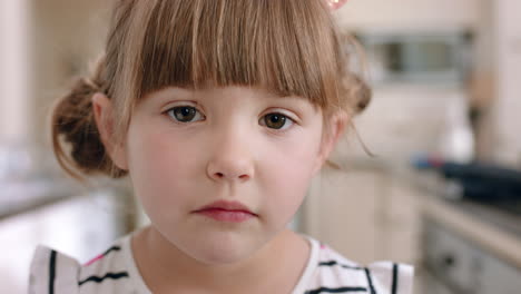 portrait-beautiful-little-girl-with-adorable-expression-looking-at-camera