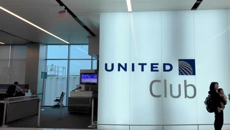 united club lounge at an airport