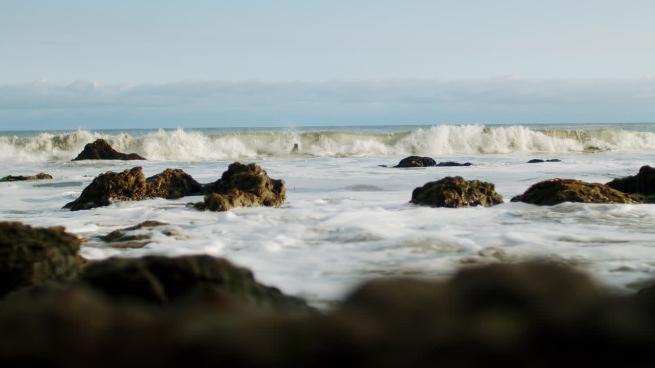 Waves Crashing on Rocks at the Coast