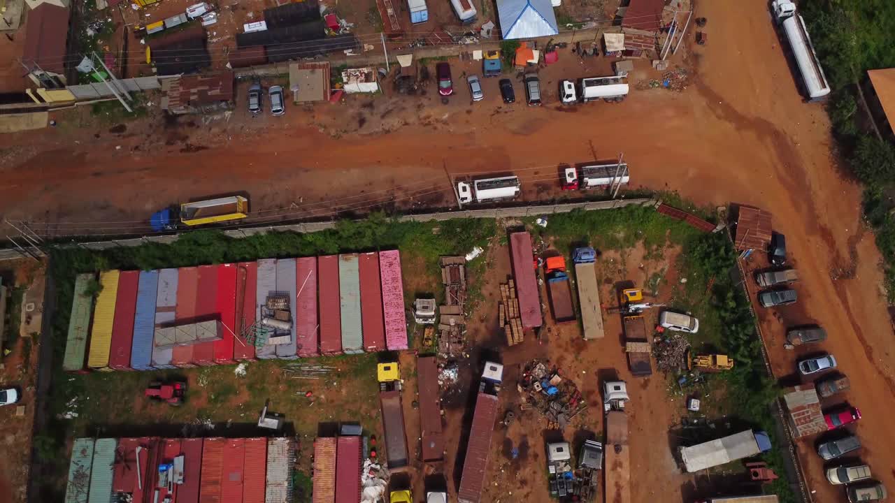 Beautiful aerial of containers and trucks stored on an industrial lot in Ibadan, Nigeria