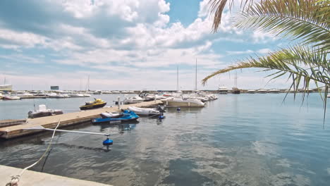 yachts on the pier at sunny day