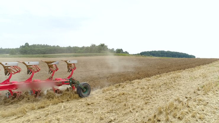 Agricultural Tractor Sowing And Cultivating Field 1