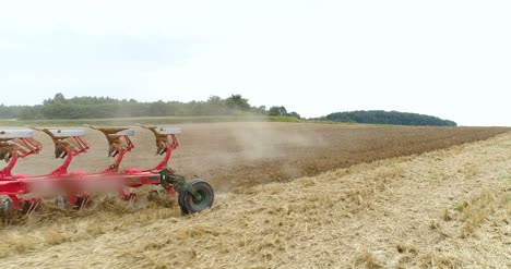 Agricultural-Tractor-Sowing-And-Cultivating-Field-1