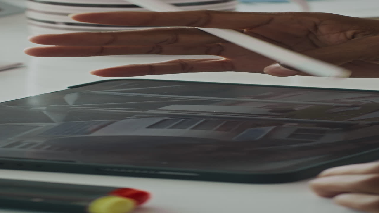 Designer Editing Scheme of Green Plant on Tablet PC with Pencil