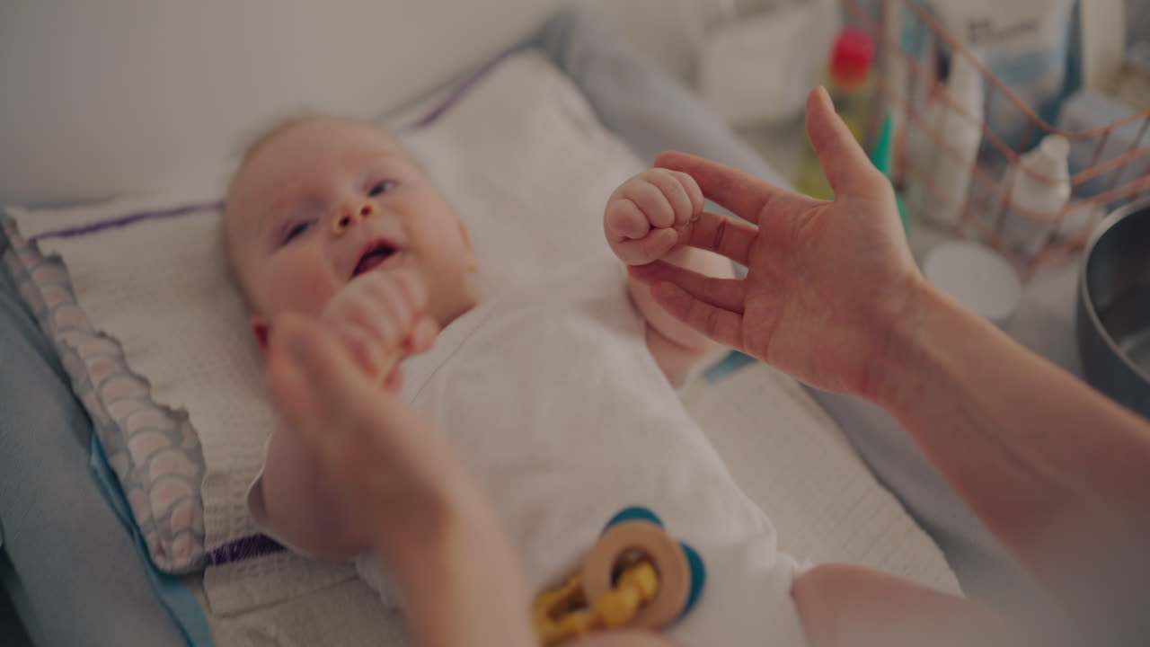 Baby Getting Dressed on Changing Table