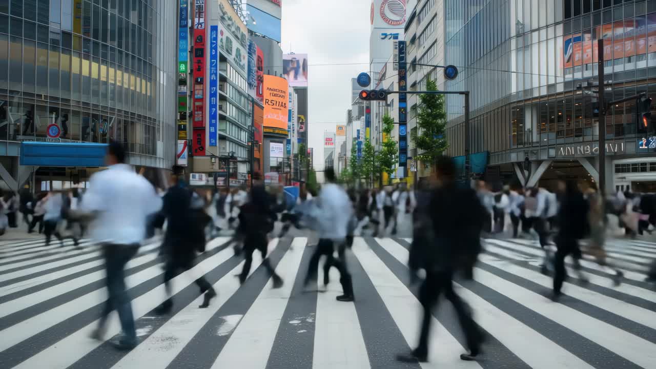 A dynamic street scene video capturing a bustling city crosswalk