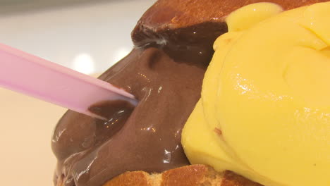 chocolate and yellow ice cream on pastry