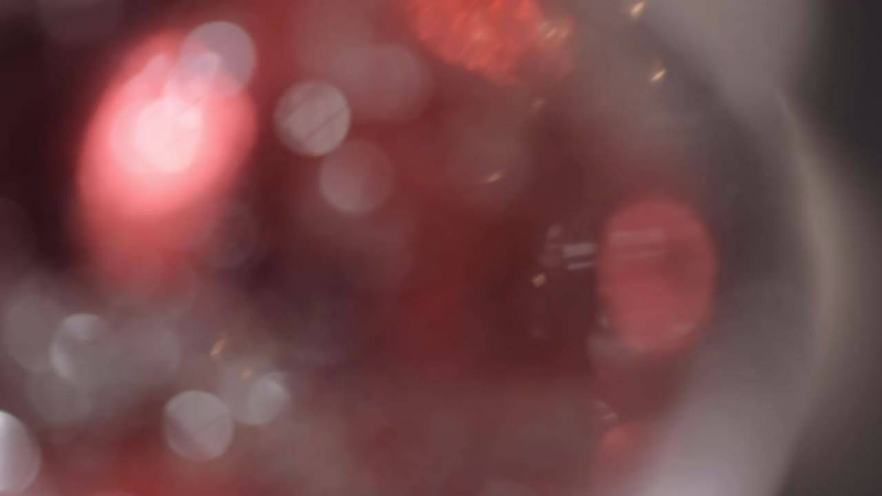 Abstract silver and gold Christmas bauble bokeh background