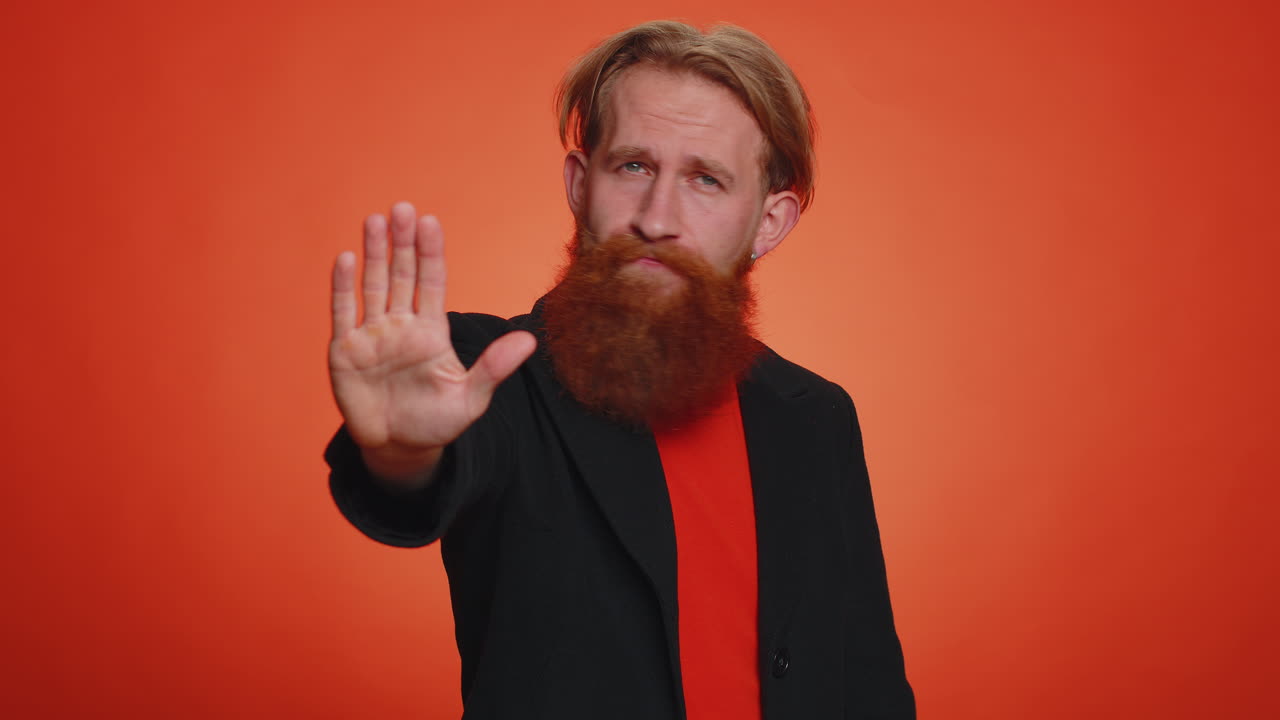 Man say no hold palm folded crossed hands in stop gesture, warning of finish, prohibited access