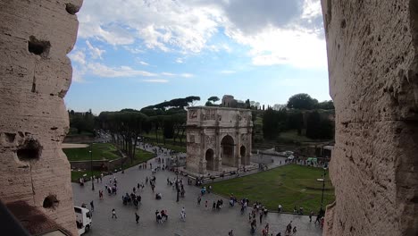 timelapse of arch of constantine in roman forum nad colosseum in rome