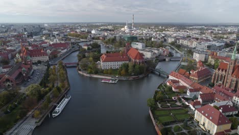 flying towards sand island passing the historic archbishops palace, wroclaw