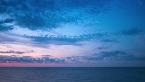 timelapse shot of the sunrise over the sea in lloret de mar, spain