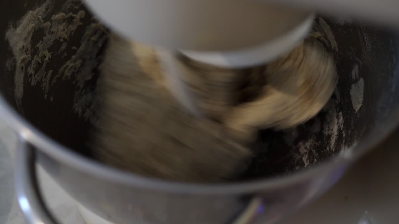 Kneading yeast dough with a dough hook using a planetary mixer