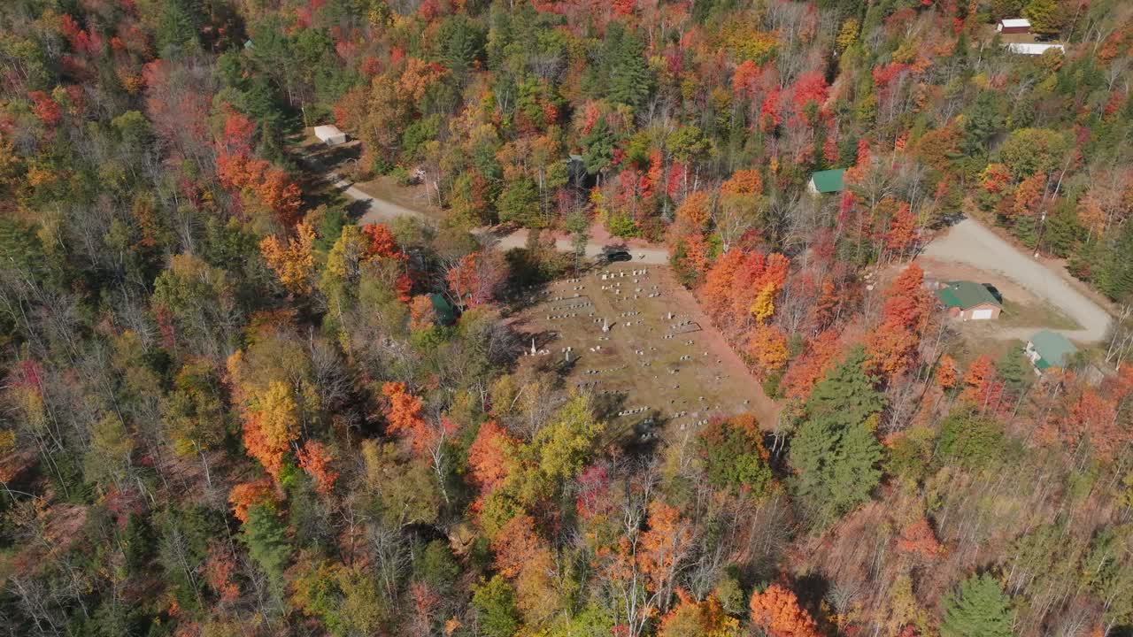 Aerial Drone View of Rural Cemetery in Maine - Peaceful Resting Place Among Autumn Trees