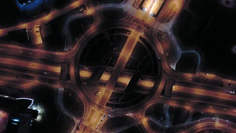 aerial of roundabout junction traffic at night