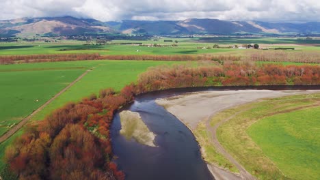 aerial drone footage of river bend with sharp bends