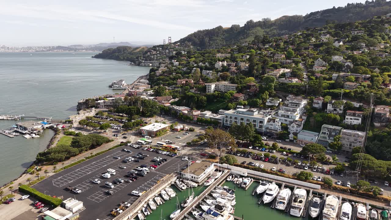 Sausalito, California USA, Drone Shot of Coastal Road, Buildings and Harbor Marina