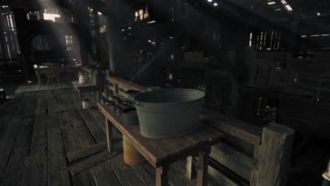 rustic barn interior with wooden table and metal bucket