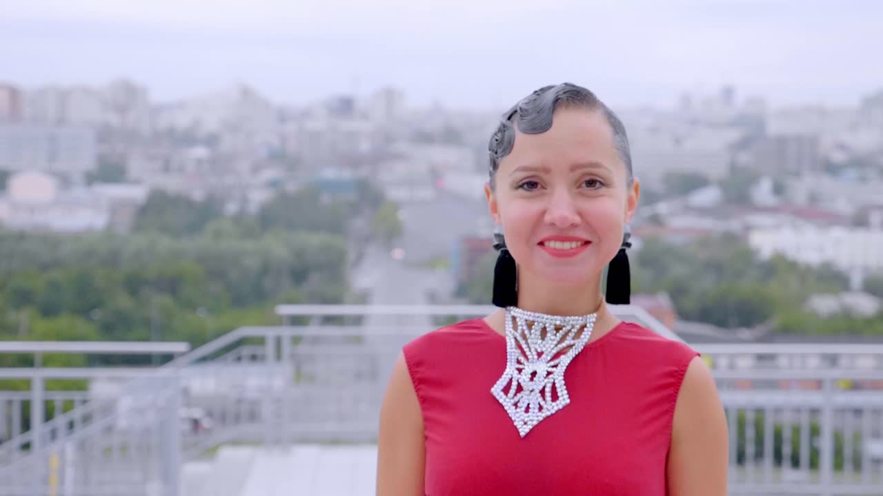 Woman in Ballroom Dress Posing in City