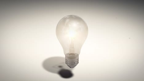 realistic light bulb is turned on. idea