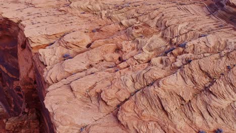 intricate rock layers of horseshoe bend glow in warm sunrise hues in arizona usa