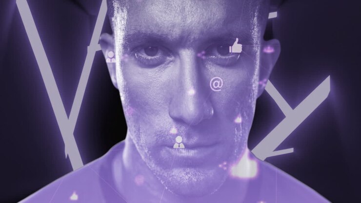 Digital icons over man against black background