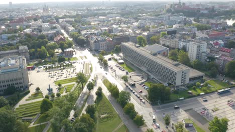 Aerial-shot-over-residential-and-office-buildings-in-Krakow-Roofs,-Cracow-in-Poland-on-a-sunny-day