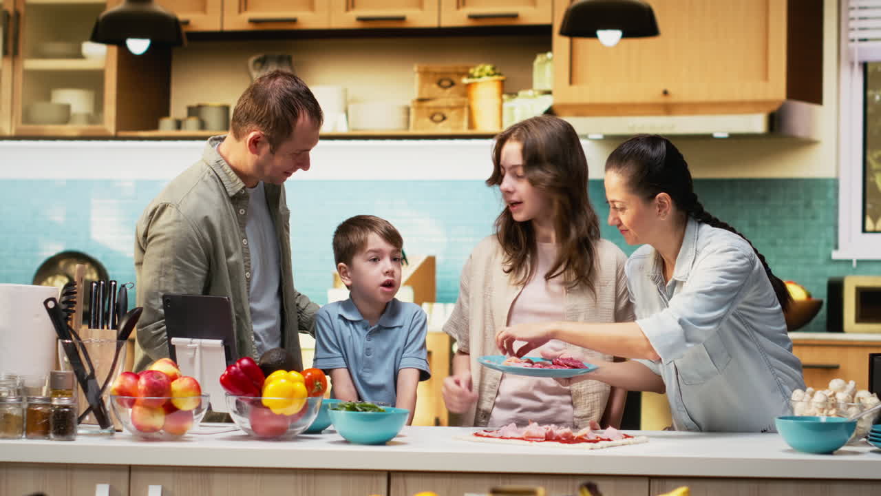 Cute parents and children preparing homemade pizza together