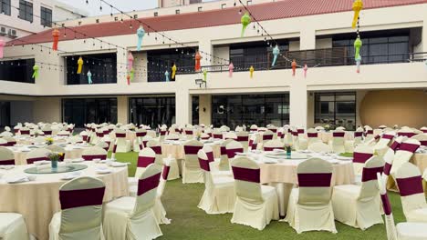 tables arranged for an outdoor event gathering