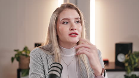 podcast recording with a blonde businesswoman
