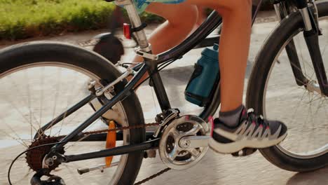 man ride bicycle near beach in barcelona, city morning, carbon neutral transportation. travel, sustainability and cycling with male speed and transit,