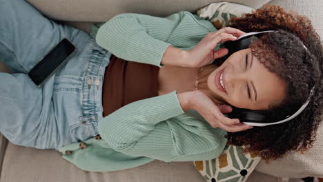 happy woman listening to music with headphones