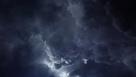 4k view of thunderstorm, a ray of light inside a dark gray cloud in the sky that moves