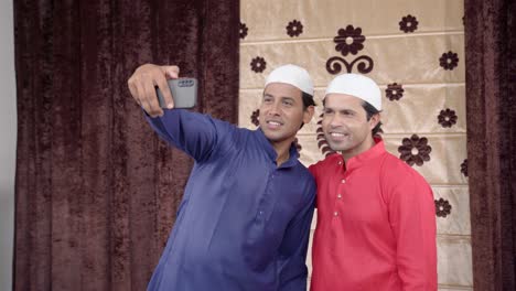 Two-muslim-men-clicking-selfie-photos