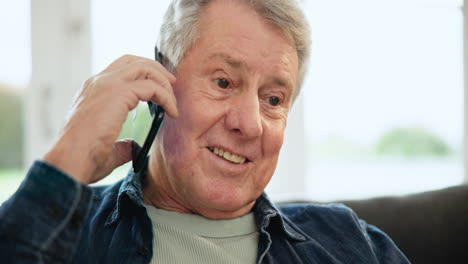 Phone-call,-smile-and-senior-man-in-living-room
