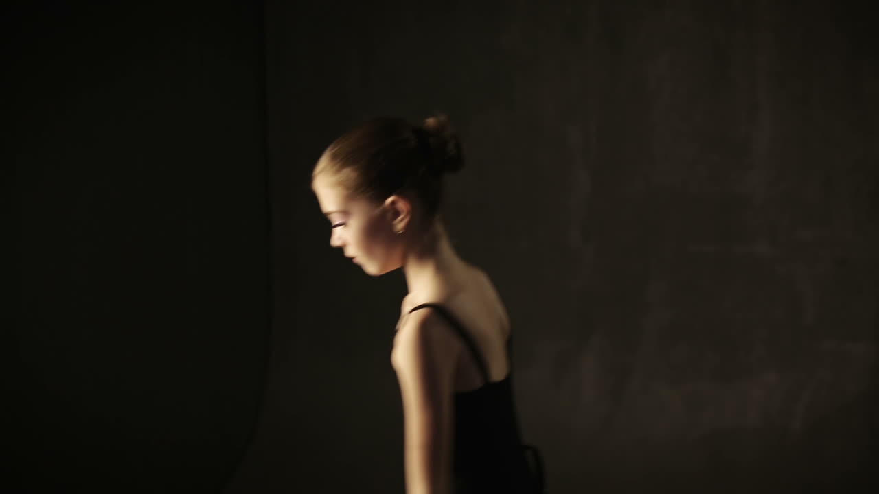 Cute little girl dreams of becoming a ballerina