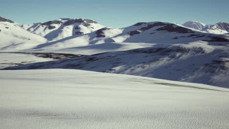 snow covered volcanic crater in iceland
