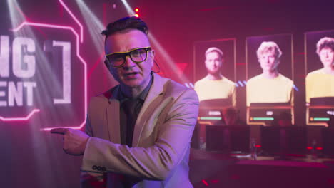esports tournament host on stage