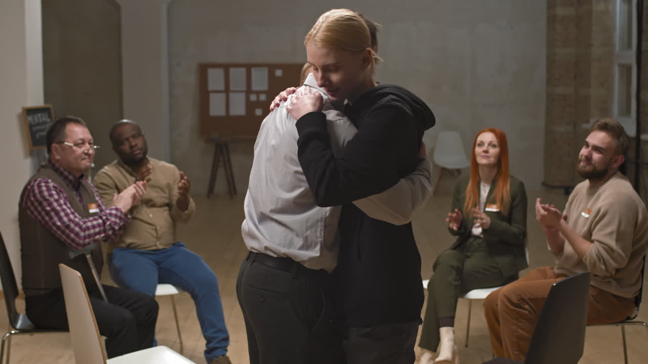 Couple Having Reconciliation at Support Group Therapy