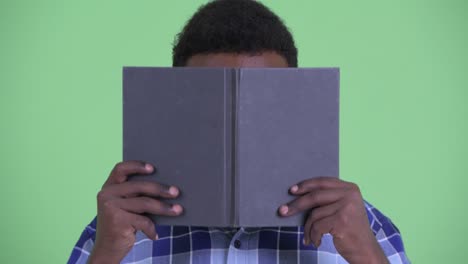 young african hipster man with afro hair wearing eyeglasses