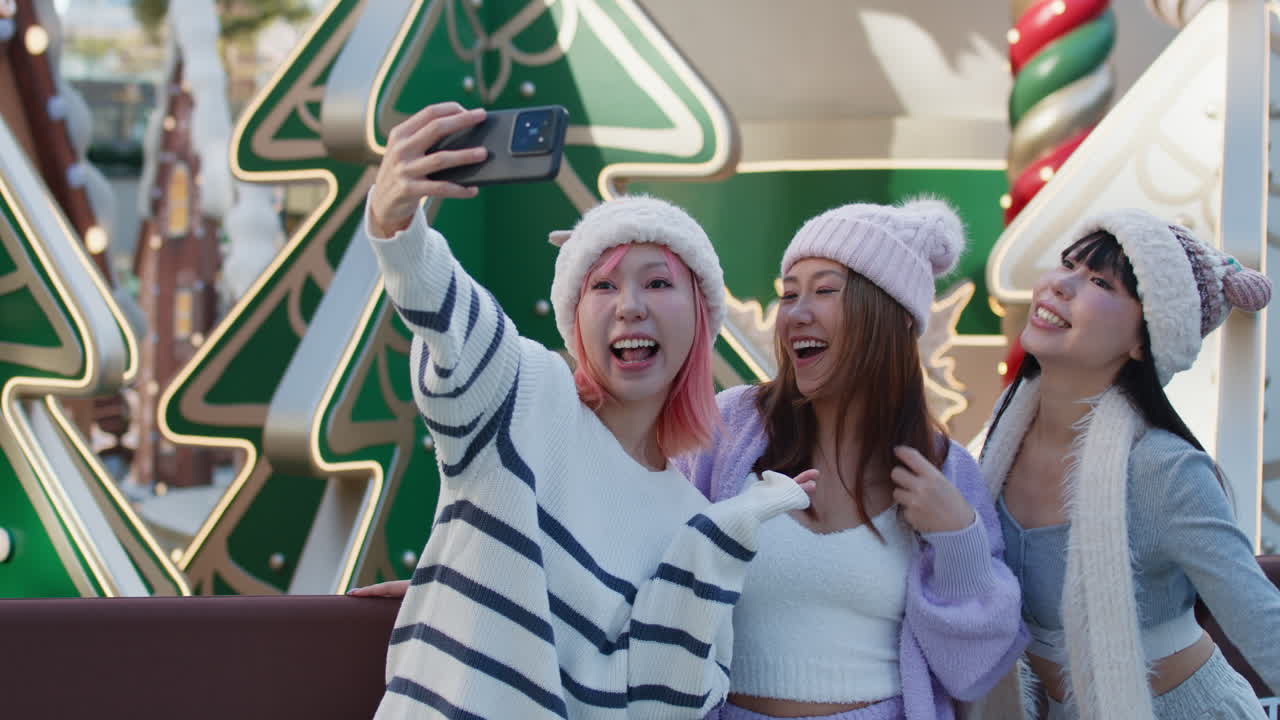 Friends taking a selfie in winter